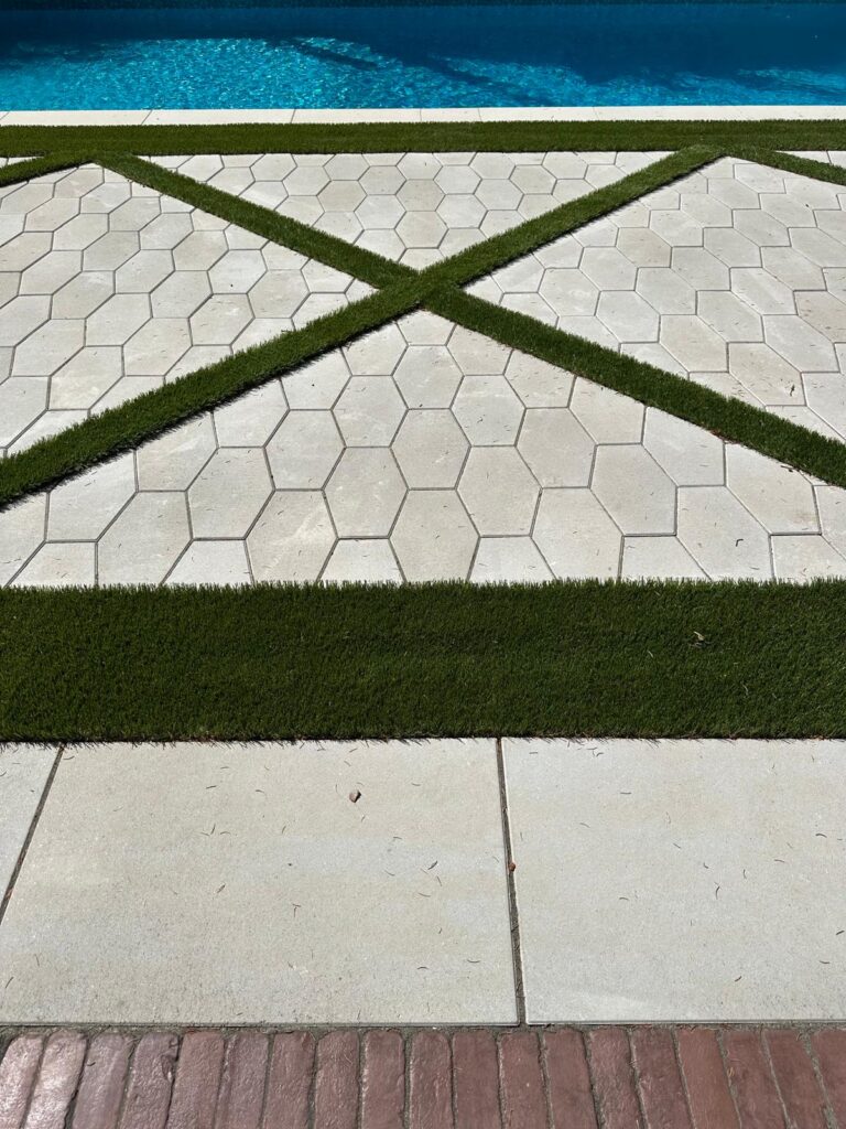 backyard frontyard grass and stone